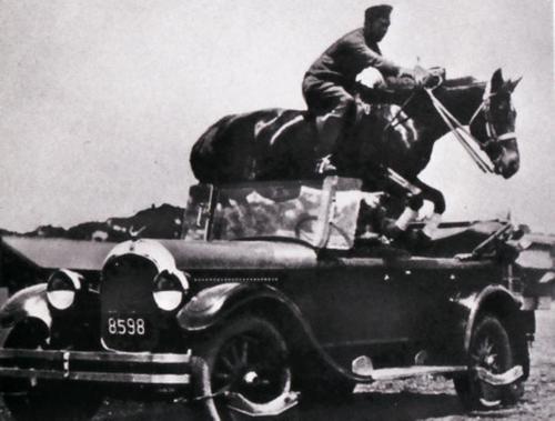 Colonel Takeichi Nishi jumping trough his car with his horse Uranus